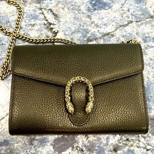 Authentic black Gucci bag, 8 inches wide.
